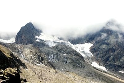 Scenic view of snow covered mountains