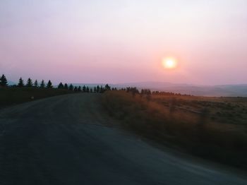 Scenic view of landscape against sky during sunset