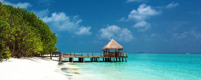 Beach hut above the ocean