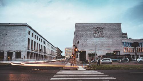 Buildings in city against sky