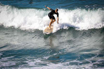 Man surfing in sea