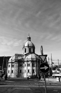 Church by street against sky