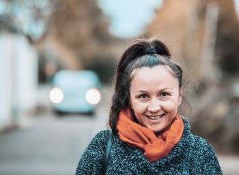 Portrait of a smiling young woman in winter