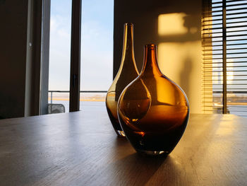 Close-up of glass on table at home