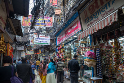People on street market in city