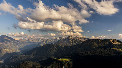 Scenic view of mountains against sky at sunset