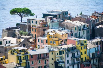 High angle view of townscape by sea