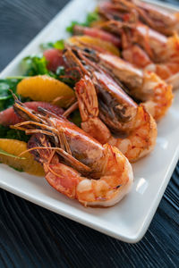 Close-up of seafood served in plate on table