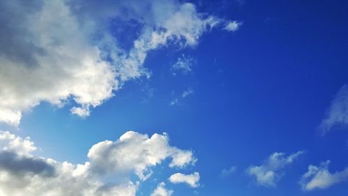 Low angle view of clouds in blue sky