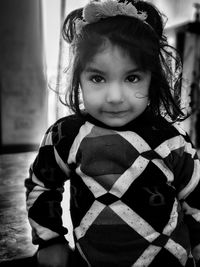 Portrait of cute girl at home