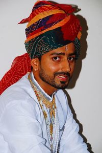 Portrait of smiling young man wearing turban