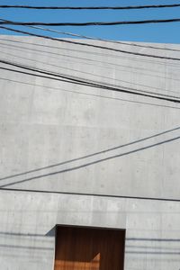 Close-up of cables against the sky