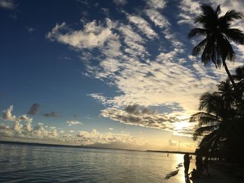 Scenic view of sea against sky at sunset