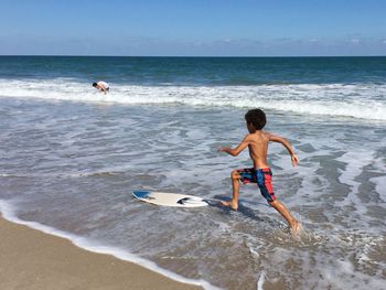 People enjoying at beach