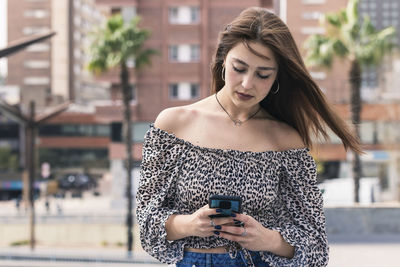 Young woman looking at camera