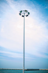 Low angle view of street light against sky