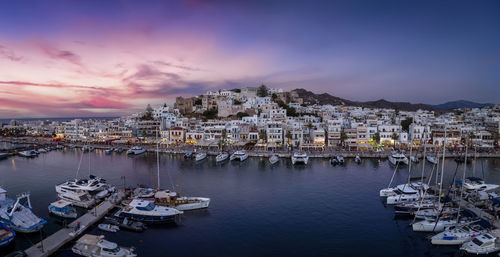 Boats moored at harbor