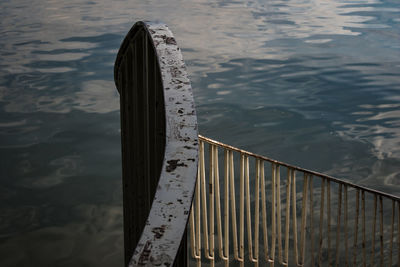 High angle view of railing by river