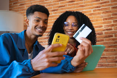 Portrait of man using mobile phone