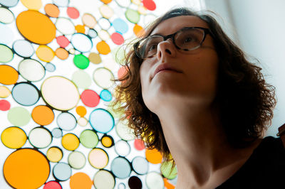 Portrait of young woman looking away