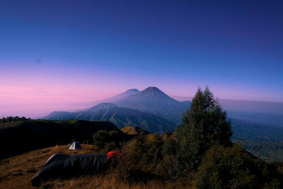 Scenic view of landscape against sky during sunset at mount prau, indonesia