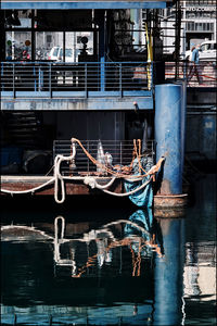 Boats moored in canal