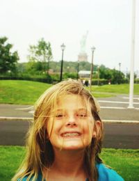 Portrait of young woman in park