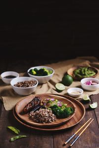 Close-up of food on table against black background