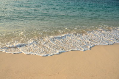 High angle view of surf on beach