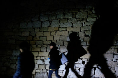 Shadow of woman in dark room