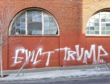 Close-up of window on brick wall