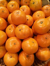 Full frame shot of oranges at market stall