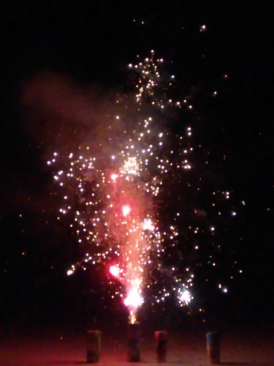 LOW ANGLE VIEW OF FIREWORK DISPLAY