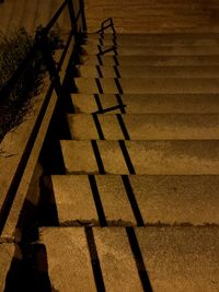 High angle view of shadow on footpath