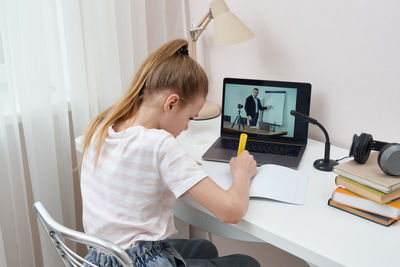 Girl attending online class