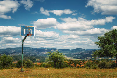 Basketball hoop on grassy field