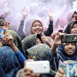 Group of people enjoying music concert