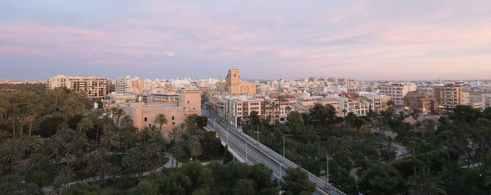 High angle view of city against cloudy sky