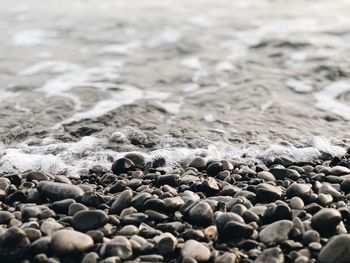 Close-up of stones on beach