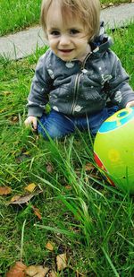 Cute boy on field