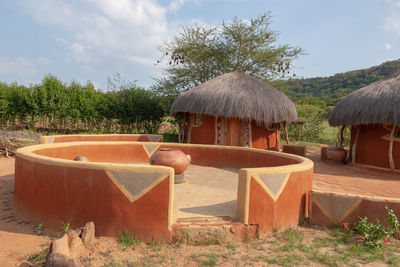 Built structure on land against sky