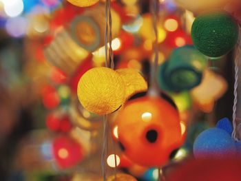 Close-up of illuminated lanterns hanging