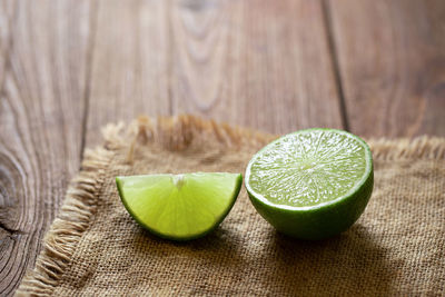 Close-up of green fruits on table