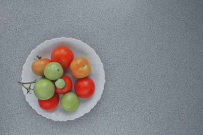 High angle view of fruits in bowl on table