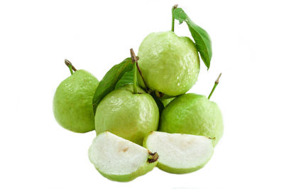 Close-up of fruits against white background