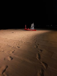 Scenic view of sea against sky at night