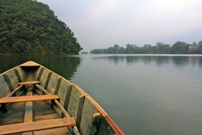 Cropped image of boat on lake