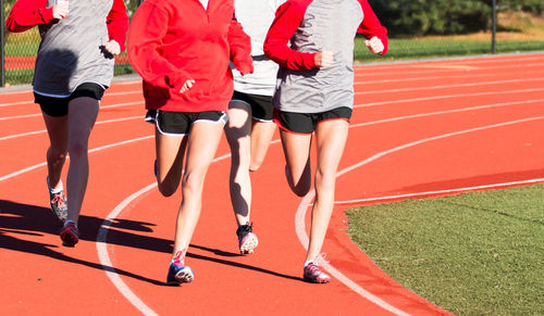 Low section of people running