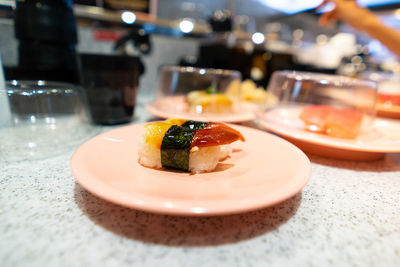 Close-up of sushi in plate on table