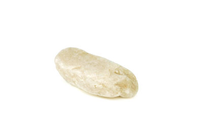 High angle view of pebbles against white background